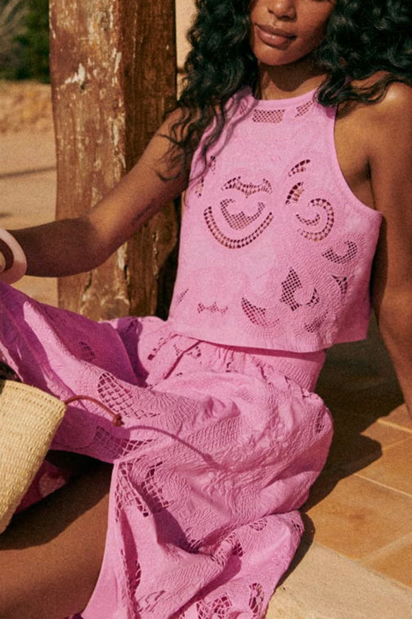 Pink lace sleeveless top and ruched midi skirt set, textured eyelet details