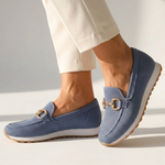 Blue orthopedic moccasin shoes with gold-tone horsebit detail and rubber tread sole