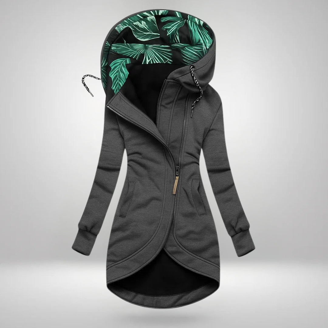 Women’s winter coat in dark gray, zip-front hood with green leafy inner lining