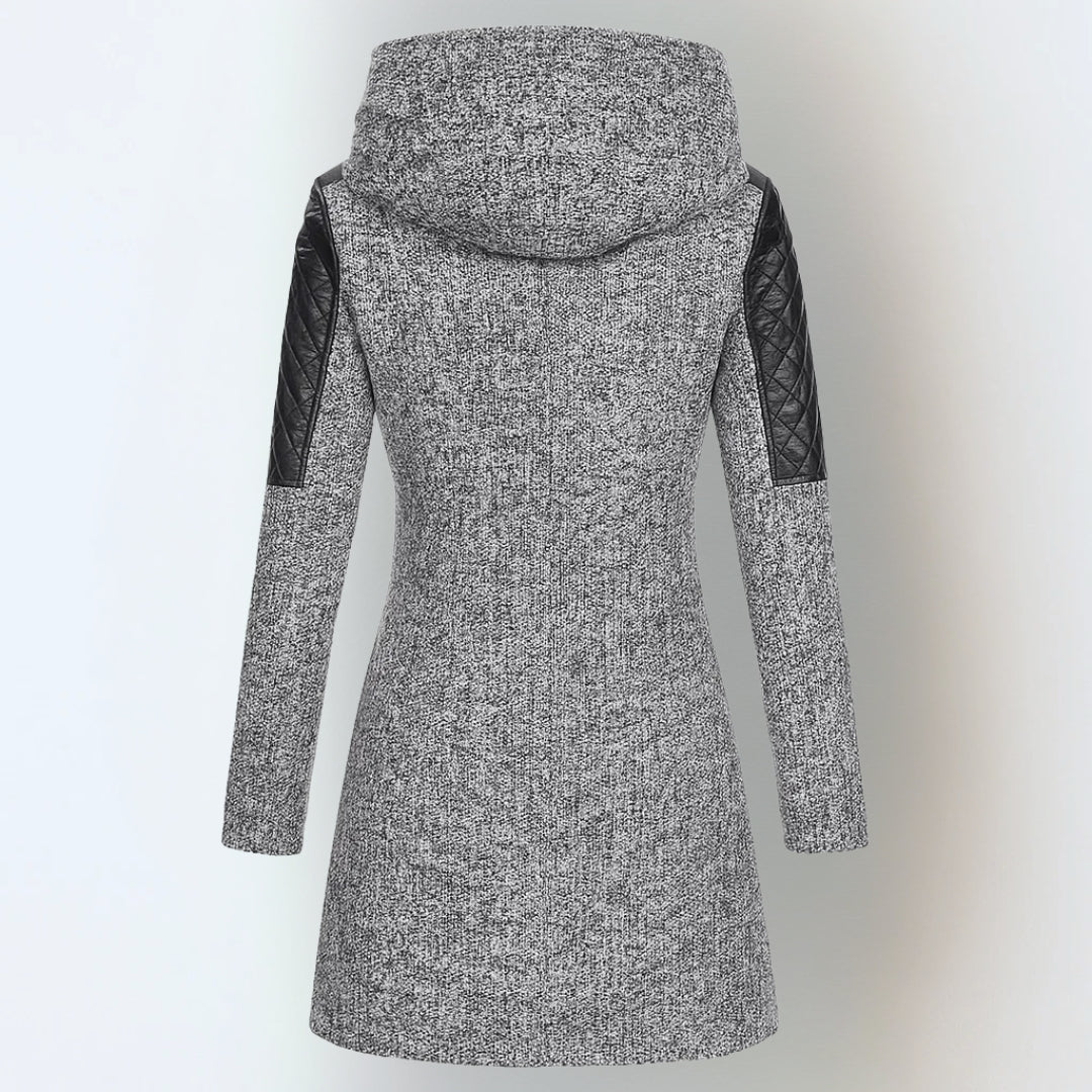 Women’s winter parka coat in light gray with hood and quilted black sleeves, back view
