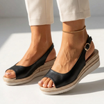 Orthopedic wedge sandals in black, open toe and ankle strap with round ring detail