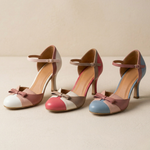 Set of three leather heeled pumps in white-pink, white-red, and white-blue colorways