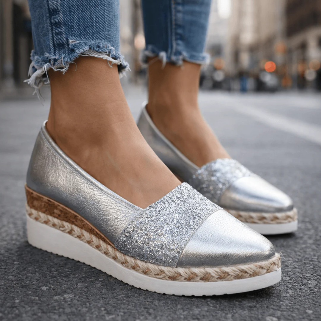 Silver glitter espadrille wedge sandal with V-cut upper and rope-wrapped sole