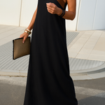 Elegant summer halter dress, black with diagonal crisscross strap and sleeveless cut