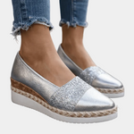 Silver glitter espadrille wedge sandal with V-cut upper and rope-wrapped sole