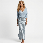 Madalina knit V-neck sweater over pale gray satin midi dress, front view