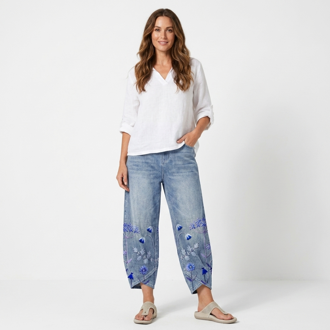 Blue denim-look casual embroidered trousers with floral and butterfly hem panels