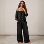 Black denim off-shoulder jumpsuit with deep neckline, button front, wide legs, pockets