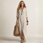 White long button-front dress with V-neck, 3/4 sleeves, side slit