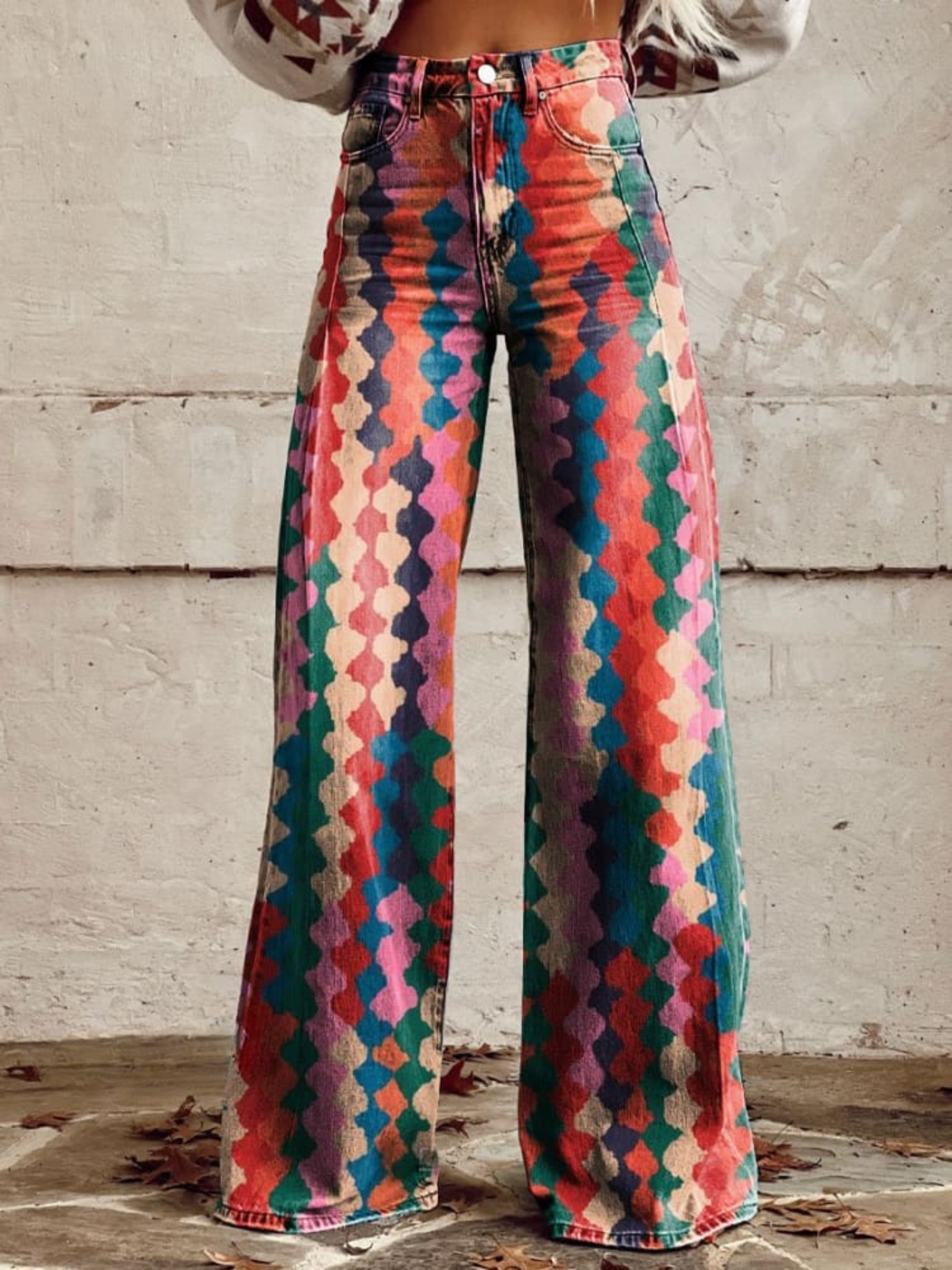 Women's wide-leg patterned trousers with colorful geometric print and button-front detail