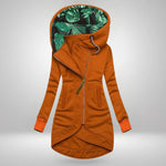 Women’s winter coat in orange, zip-front hood with green leafy inner lining