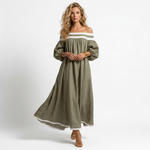Olive long off-shoulder maxi dress with light stripe at neckline and flowing skirt hem.