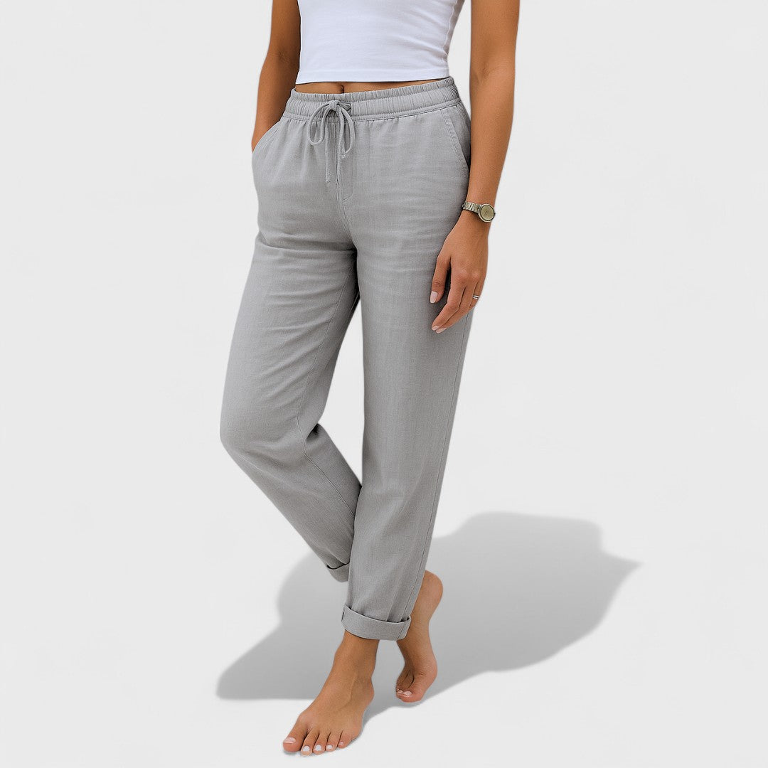 Light gray elastic linen jogger pants with drawstring waist and cuffed ankles