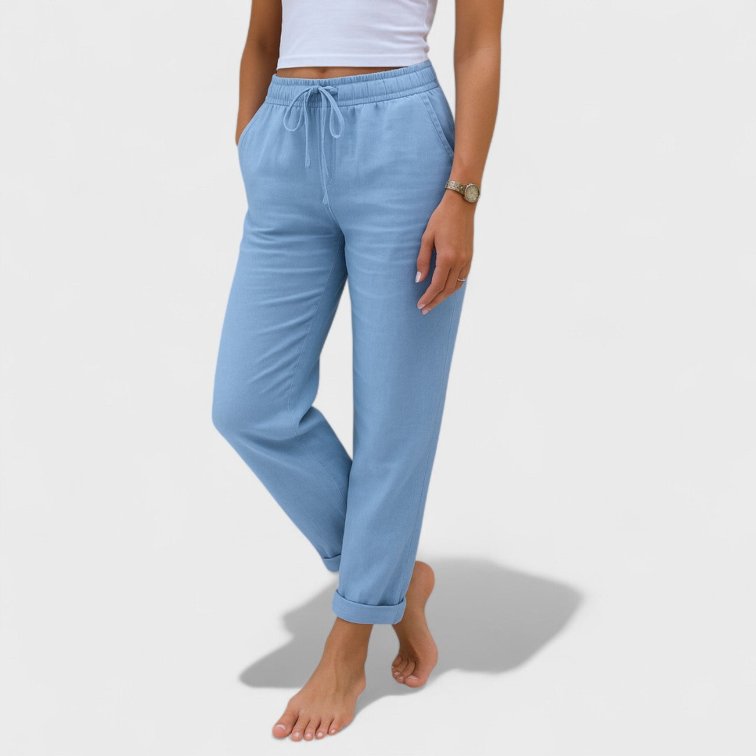 Light blue elastic linen jogger pants with drawstring waist and cuffed ankles