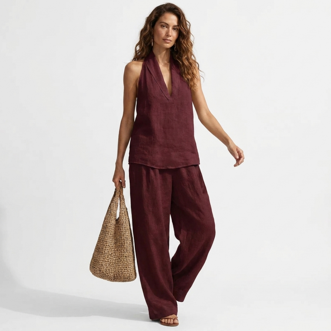 Two-piece V-neck linen set with sleeveless top and wide-leg pants in burgundy.
