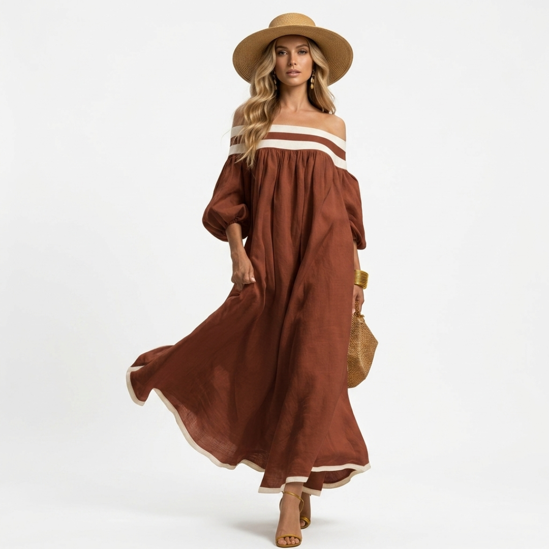 Rust brown long off-shoulder maxi dress with white stripe at neckline and wide sleeves.