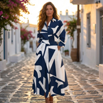 Elegant cotton dress with pointed collar, long sleeves, navy and white abstract print