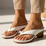 White slide sandal with wide strap and mid block heel platform sole