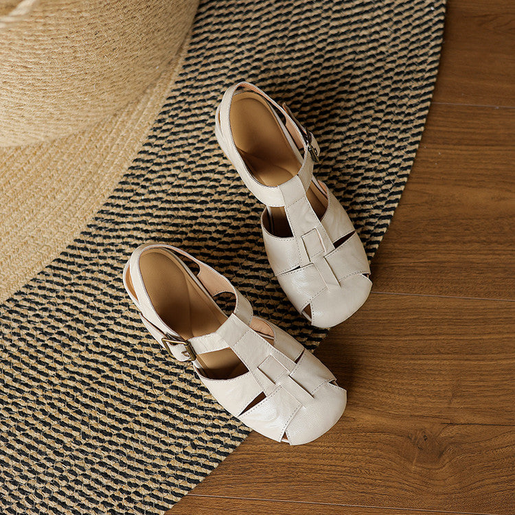 Beige natural leather sandals with open toe and buckle ankle strap