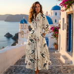 Elegant cotton dress with pointed collar, long sleeves, cream floral and animal print