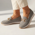 Dark gray orthopedic moccasin shoes with gold-tone horsebit and textured fabric upper