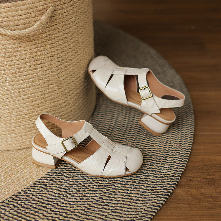 Amaya leather sandals in beige/cream with crisscross straps and metal buckle