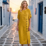 Yellow midi dress with buttoned front and half-length sleeves