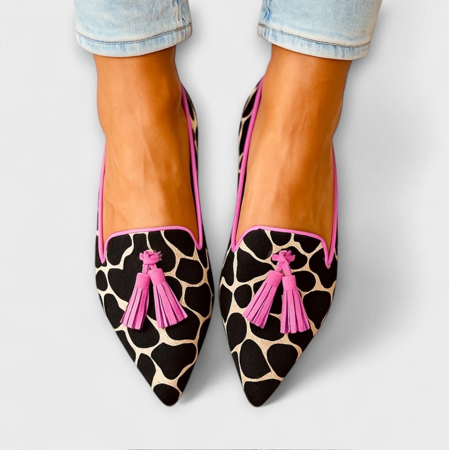 Julia cow-print loafers with pink tassels and pink trim