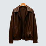 Florence brown leather jacket with snap collar, zip front, and side pockets