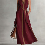 Elira linen dress in burgundy with deep V-neck and diagonal tie panel, sleeveless maxi
