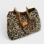 Leopard print canvas tote bag with double handles and zip pocket