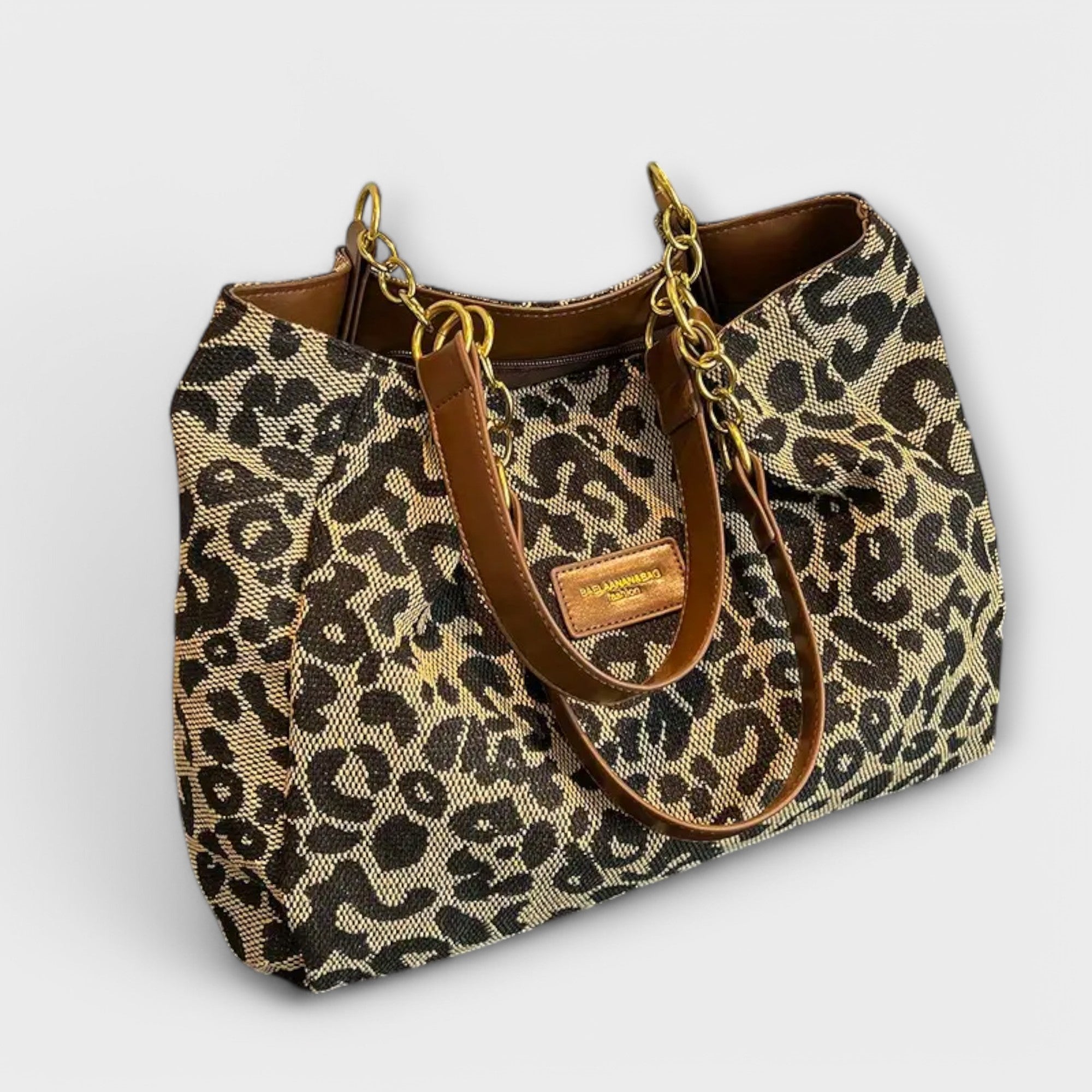 Leopard print canvas tote bag with double handles and zip pocket