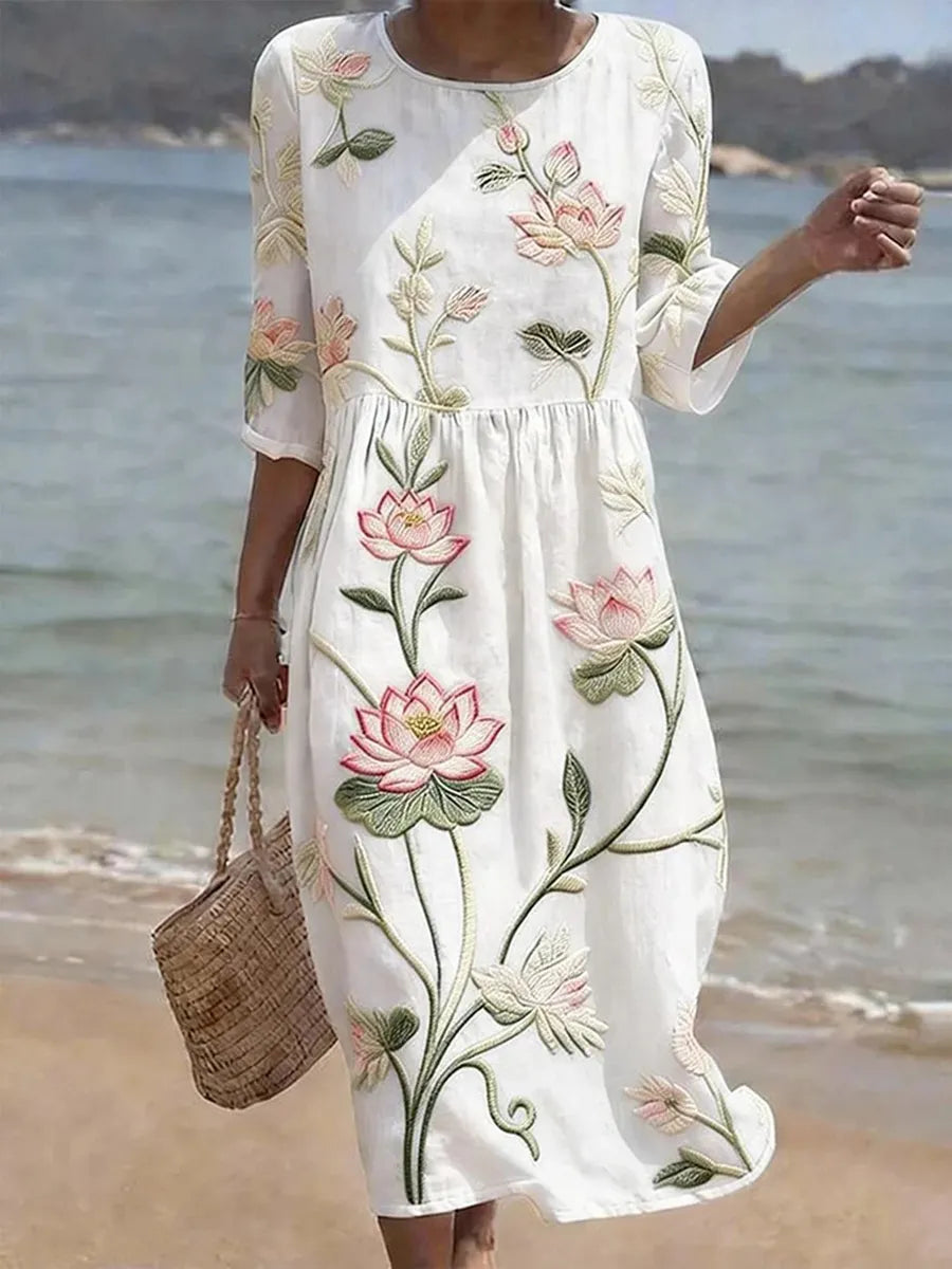 Kayla white midi dress with botanical and floral print, gathered waist, elbow sleeves