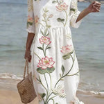 Kayla white midi dress with botanical and floral print, gathered waist, elbow sleeves