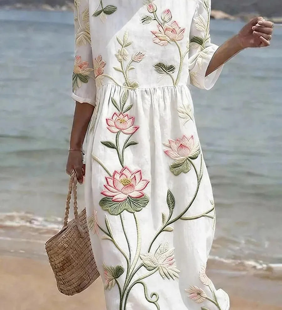 Kayla white midi dress with botanical and floral print, gathered waist, elbow sleeves
