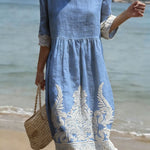Light blue floral and leaf-print midi dress, round neck, 3/4 sleeves, gathered waist