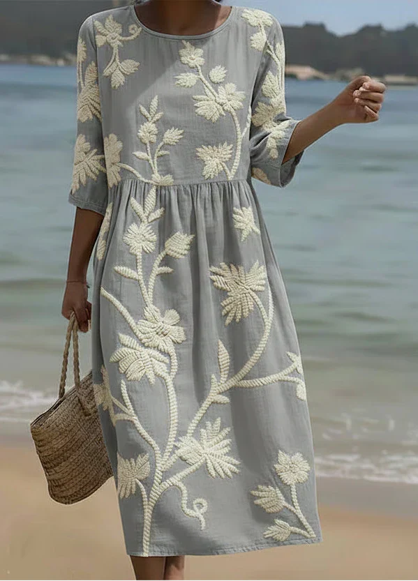 Women's midi dress in light gray with white botanical floral pattern and gathered waist