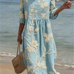 Kimberly light blue midi dress with cream floral plant embroidery, short sleeves