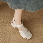 Amaya leather sandals in beige with cross straps and adjustable metal buckle