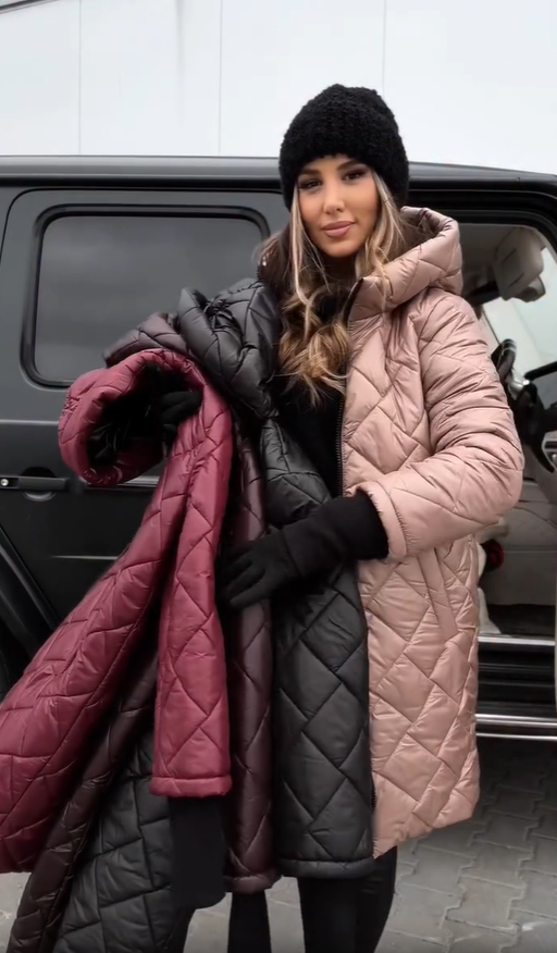 Two-tone quilted hooded puffer coat in beige, pink, and dark panels