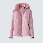 Rose pink hooded jacket with full-zip, leaf pattern, and black trim