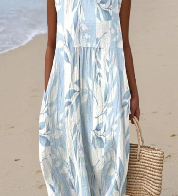 Sleeveless midi dress with blue leafy print, gathered waist