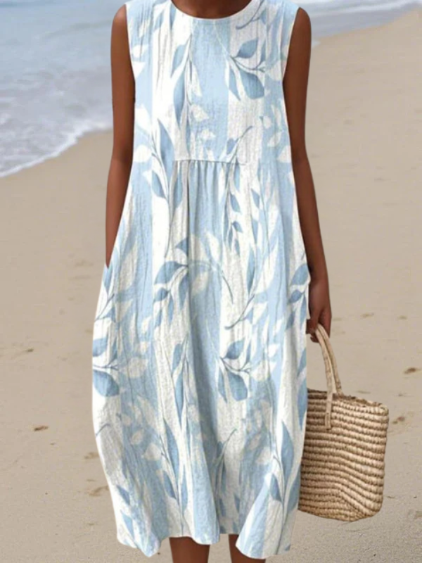 Sleeveless midi dress with blue leafy print, gathered waist