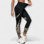 High-waist black training leggings with leopard-print panels down the legs