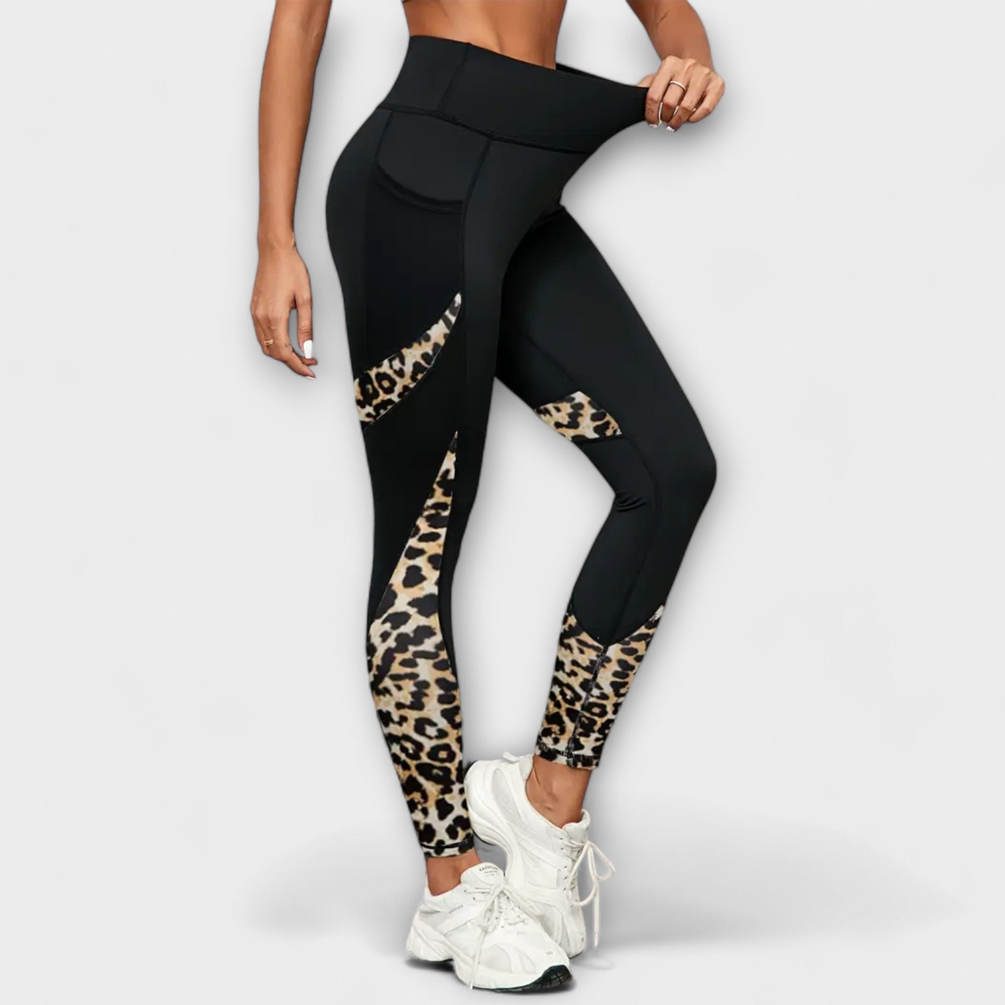 High-waist black training leggings with leopard-print panels down the legs