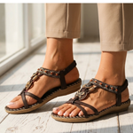 Brown orthopedic sandals with toe loop straps and decorative charm bead trim