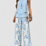 Light blue sleeveless layered top and wide-leg pants set with leaf print