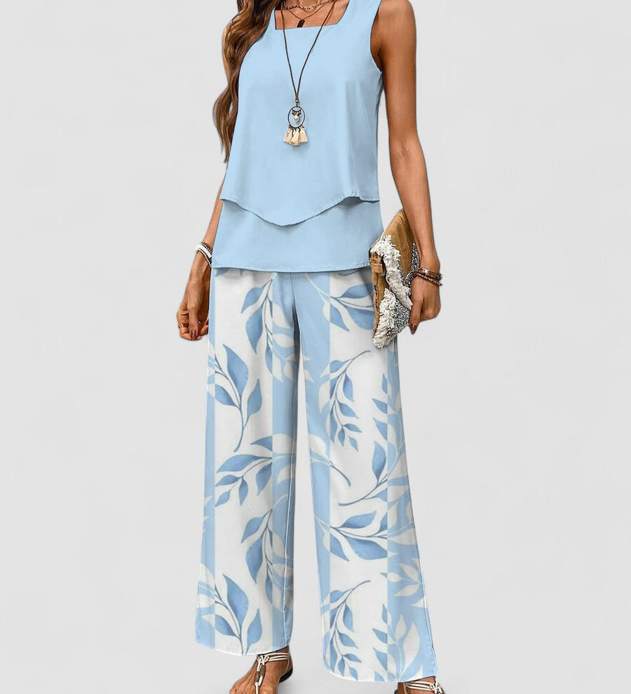Light blue sleeveless layered top and wide-leg pants set with leaf print