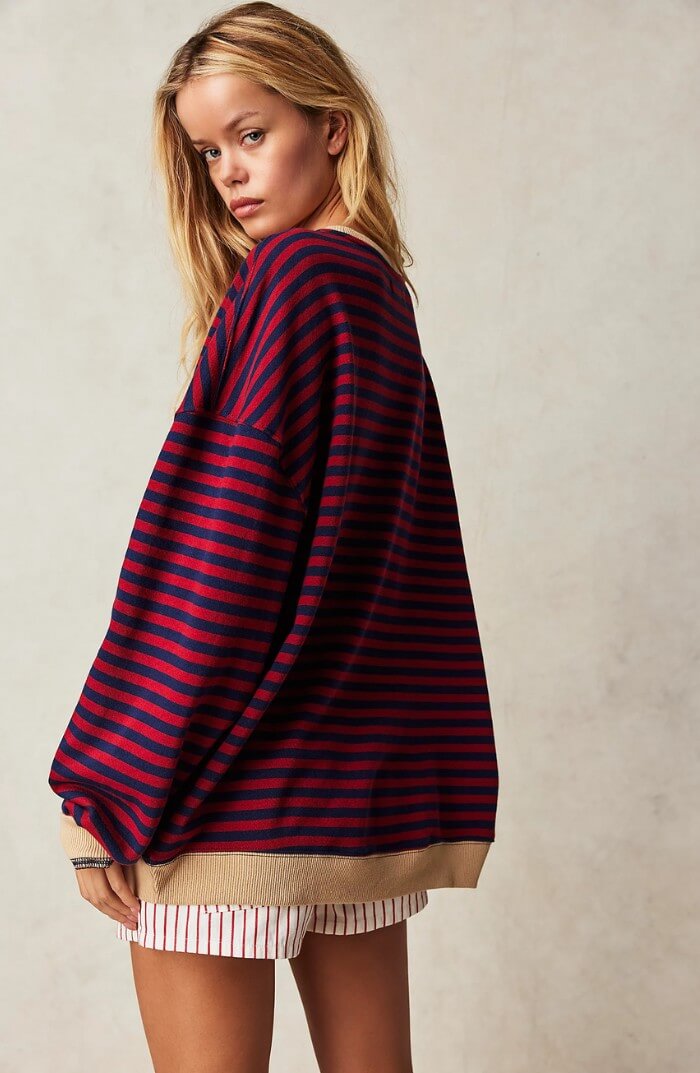 Burgundy and navy striped oversized pullover with long sleeves and ribbed hem