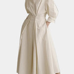 Beige long button-front dress with puff sleeves and tied waist, A-line midi skirt